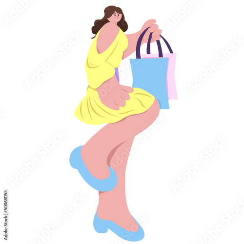 Beautiful young woman with shopping bags in their hands during the sale or discount 