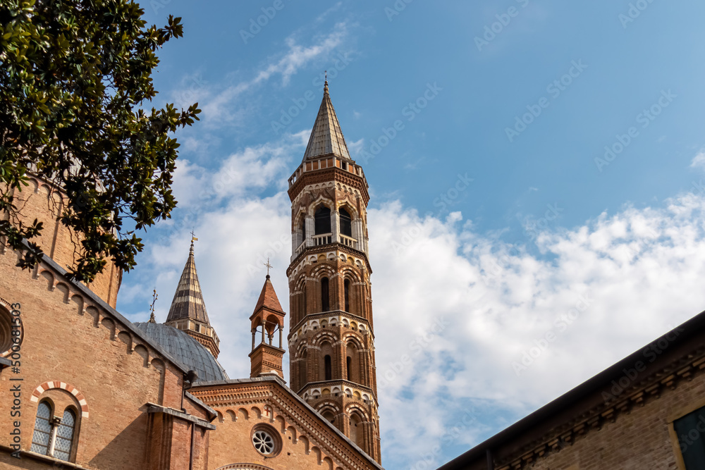 Scenic view on the tower of the basilica of Saint Anthony in Padua, Veneto, Italy, Europe. Church in Padova. Clouds surrounding the building. Roman Catholic church. Northern Italian city