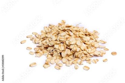 Heap of dry rolled oats isolated