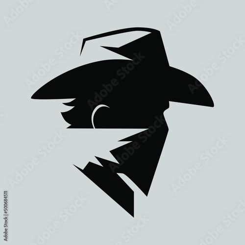 Cowboy masked outlaw symbol side view on gray backdrop. Design element photo
