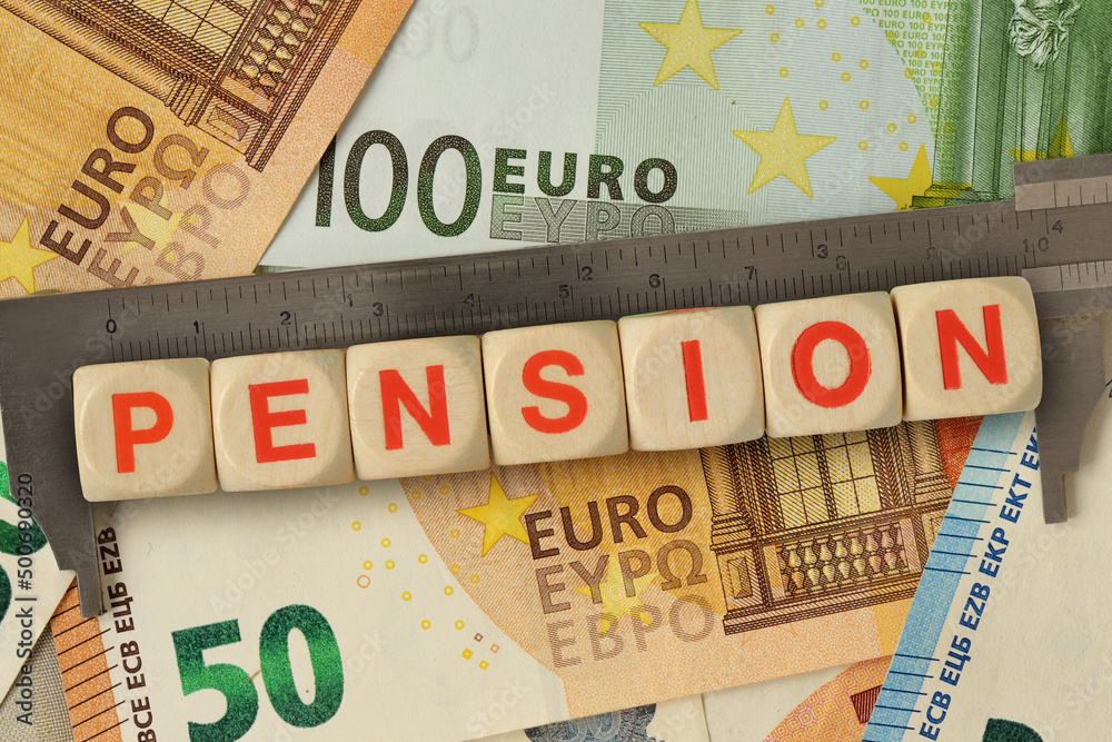 Vernier caliper and wooden blocks with the word Pension on euro money background - Concept of calculating pension Vernier caliper and wooden blocks with the word Pension on euro money background - Concept of calculating pension