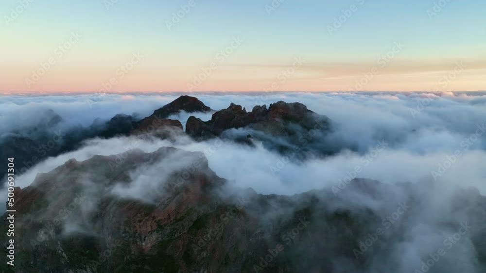Top view of the third mountain on Madeira isalnd. Drone flight of the moutains in the morning light. Foggy morning on Madeira. Madeira, Portugal Top view of the third mountain on Madeira isalnd. Drone flight of the moutains in the morning light. Foggy morning on Madeira. Madeira, Portugal