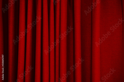 closeup red curtain wave texture pattern for background