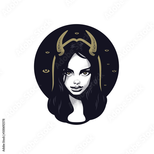 A mystical look. A devil woman with horns on her head. Black background. Magically it comes from the eyes.
