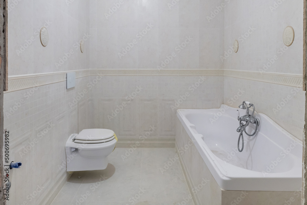 metal water tap with sink and faucet to turn on and regulate cold or hot water in expensive bathroom. metal water tap with sink and faucet to turn on and regulate cold or hot water in expensive bathroom.