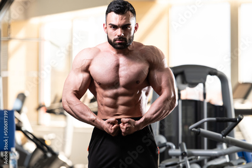 Handsome Body Builder Making Most Muscular Pose
