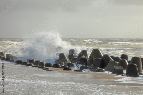 wind breaker at the coast in Sylt in bad weather, Hoernum photo