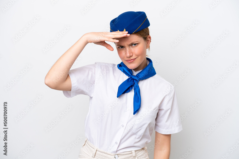 Airplane stewardess woman isolated on white background looking far away with hand to look something Airplane stewardess woman isolated on white background looking far away with hand to look something
