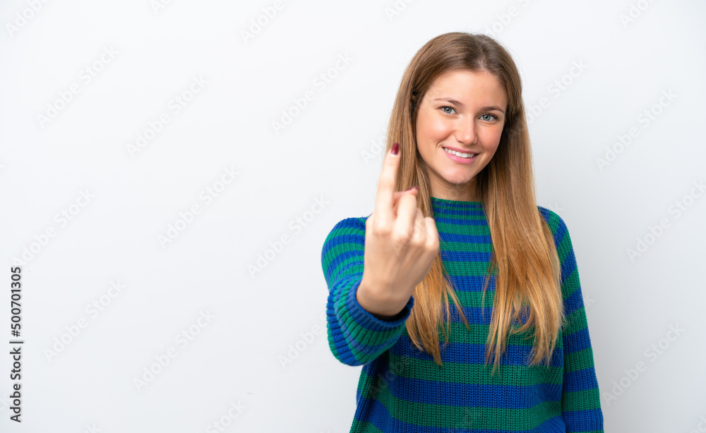 Young caucasian woman isolated on white background doing coming gesture Young caucasian woman isolated on white background doing coming gesture