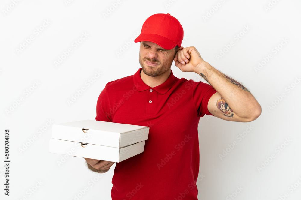 pizza delivery man with work uniform picking up pizza boxes over isolated white wall frustrated and covering ears pizza delivery man with work uniform picking up pizza boxes over isolated white wall frustrated and covering ears