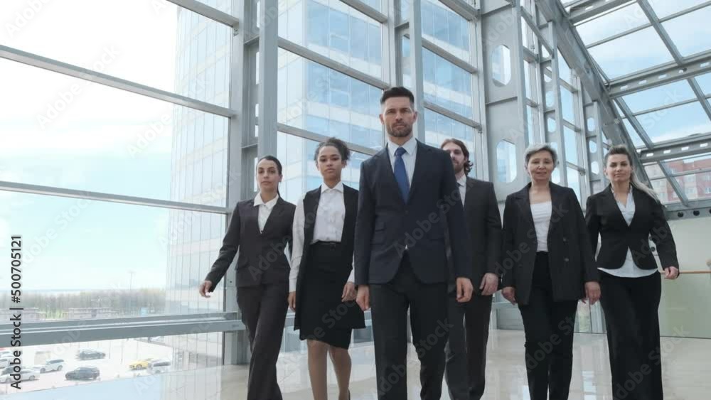 Portrait of business people team standing with arms crossed in office Portrait of business people team standing with arms crossed in office