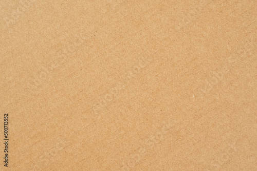 Recycled wrapping kraft paper texture. Grunge brown package cardboard background