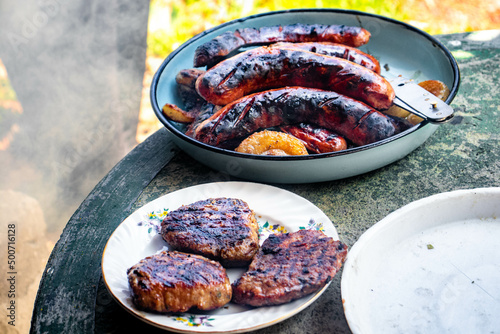 grilled sausages on a grill