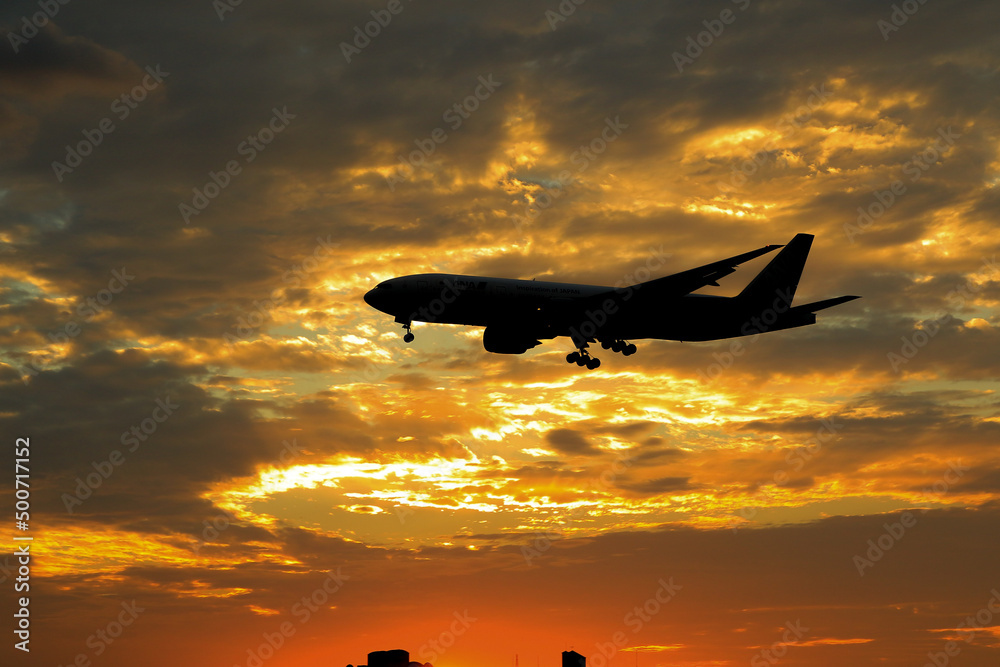 airplane at sunset airplane at sunset
