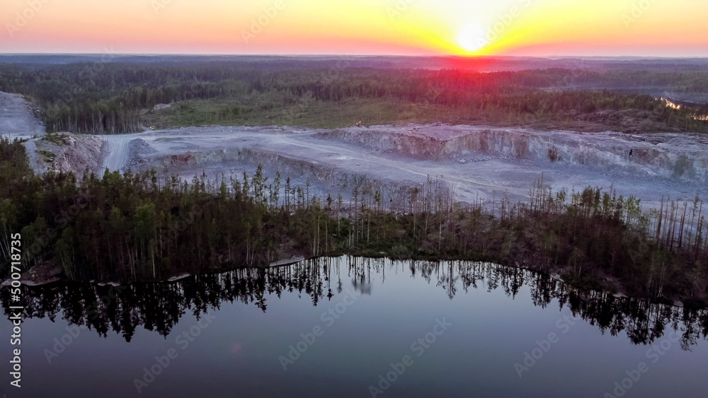 Fototapeta premium Flight over lakes and forests in Karelia near the village of Kuznechnoye in Russia.