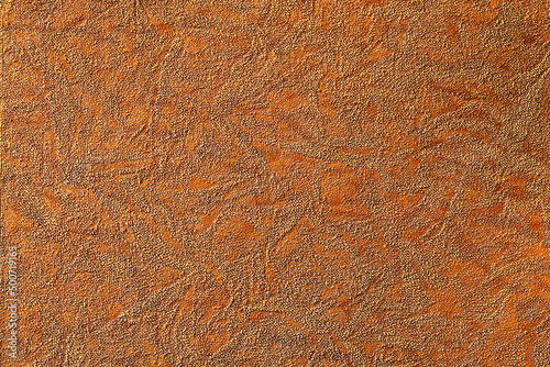 Orange and gold background with abstract pattern of various shapes