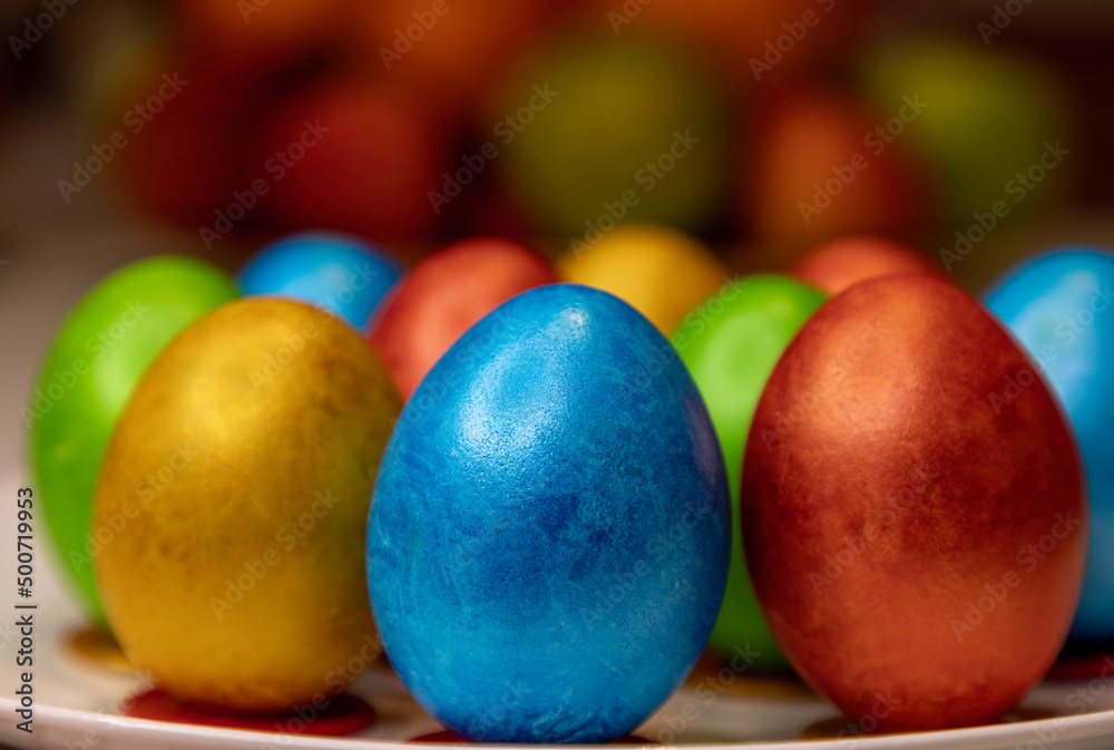 Obraz premium Colorful Easter eggs close-up in motion