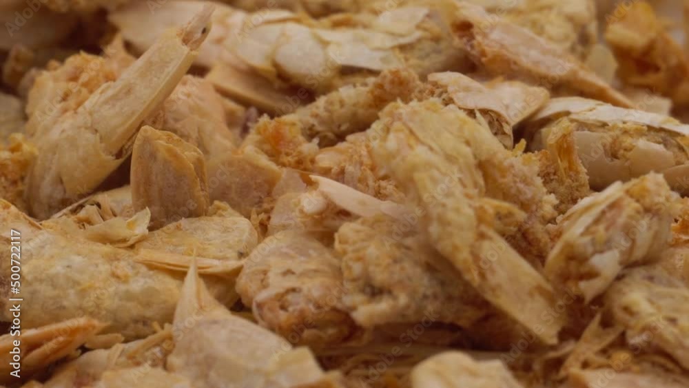 Dried shrimp closeup on white background. Selective focus