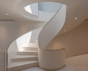 Fotobehang Trappen Moderne wenteltrap met licht en schaduw  © pomphotothailand