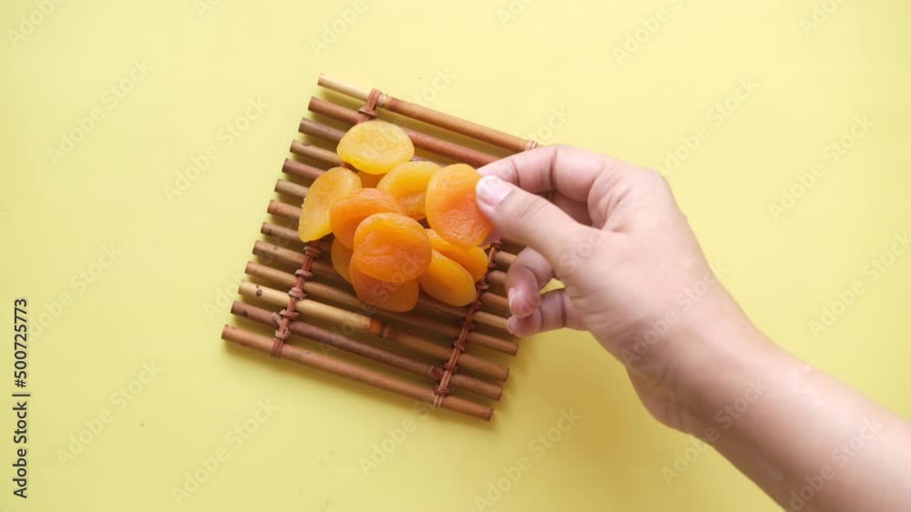 Apricot fruit half on wooden board on table Apricot fruit half on wooden board on table