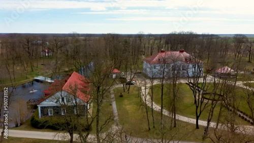 Amazing Aerial View Bistrampolis Palace and Parkin Lithuania, Panevezys District. Historic Palace in the Neoclassical Style. 4K UHD Resolution
 photo