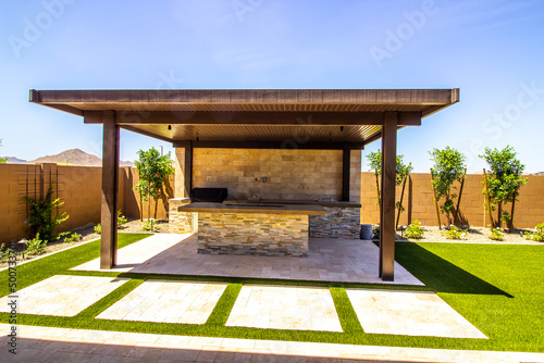 Rear Yard Pergola Covering Built In BBQ Area