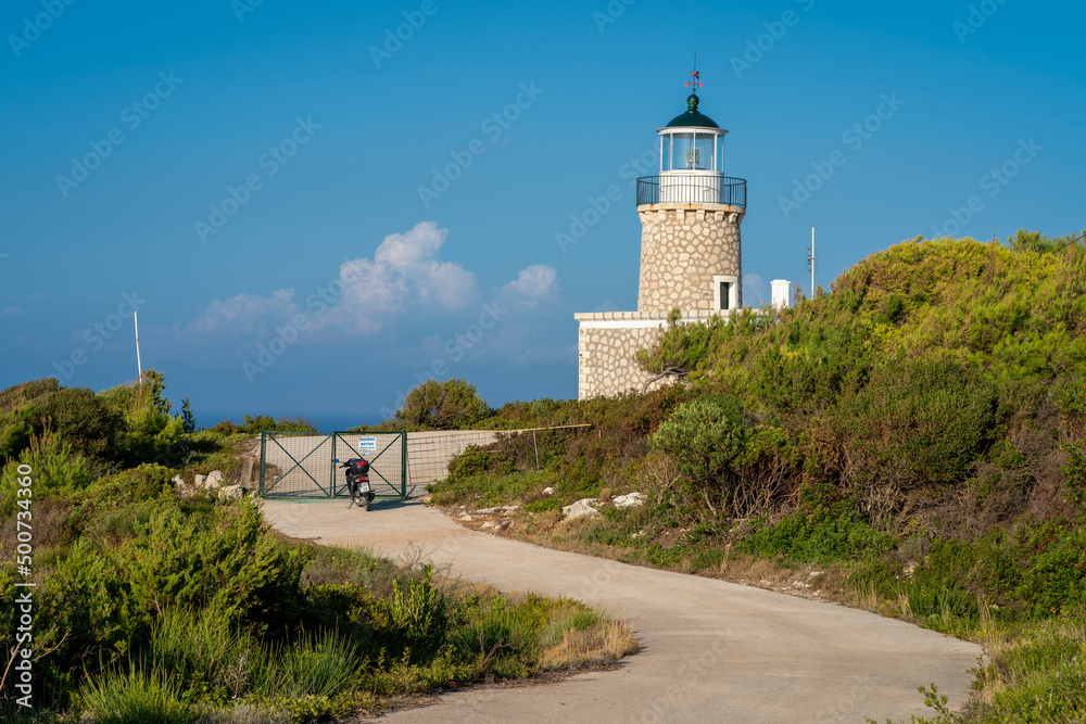 Skinari Lighthouse located at the northern cape of Zakynthos island in Greece. Zante, near Korithi above Cape Skinari. Summer, day time, sunset..good vibe.