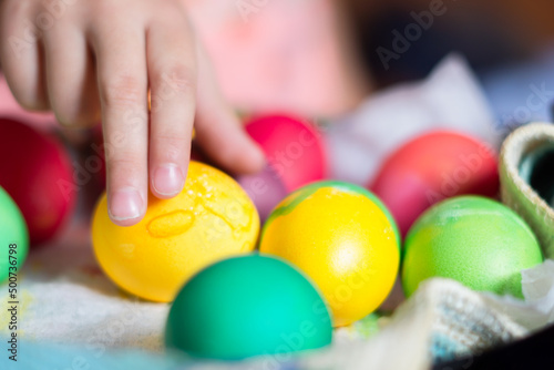easter eggs in hand