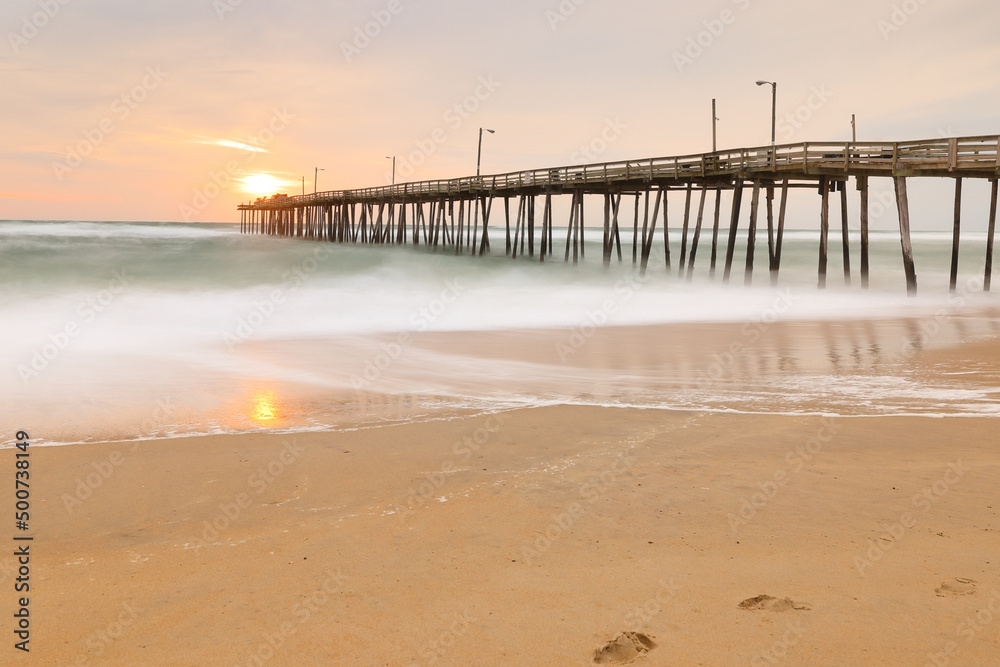 Beautiful sunrise at Nags Head Pier, Outer Banks, North Carolina, USA. 