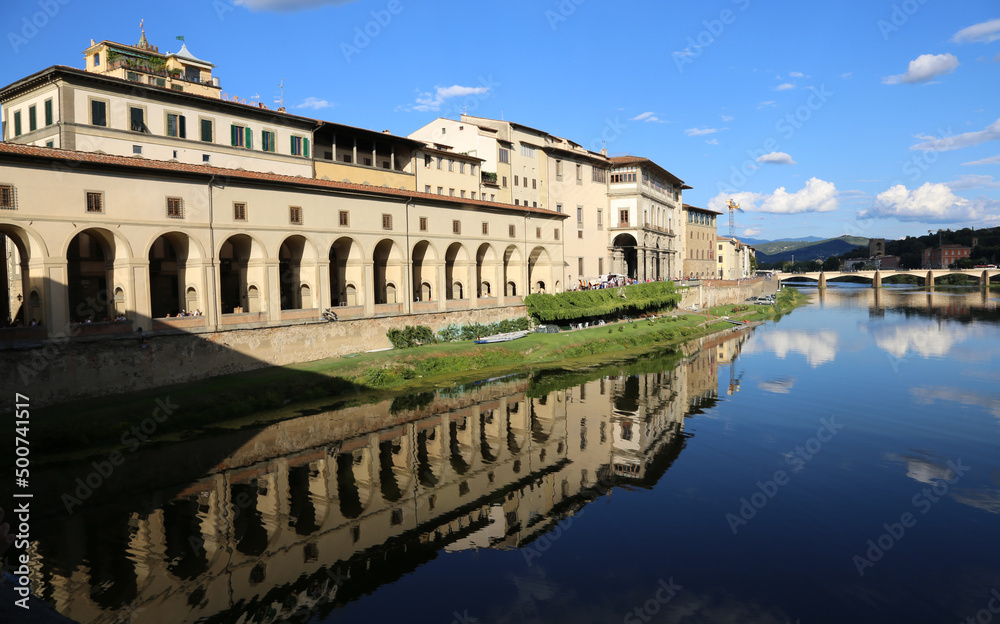 Long arcade and ther river Arno called CORRIDOIO VASARIANO in the city of Florence in the region of Tuscany in ITALY