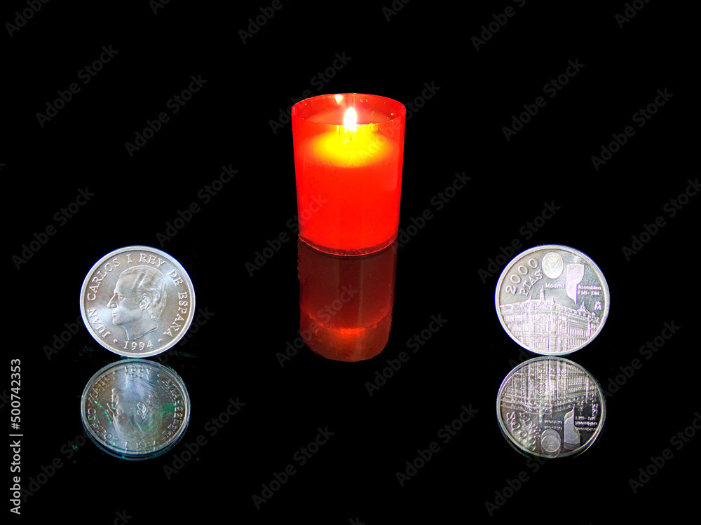 Monedas, reflejo, equilibrio