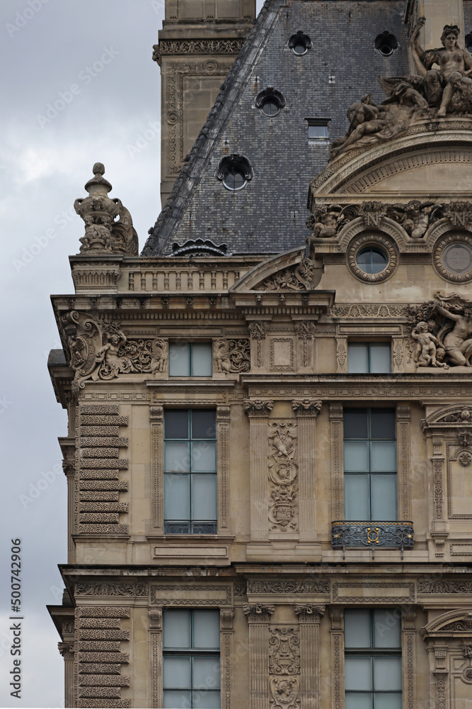 Detail of the facade of the Louvre in Paris