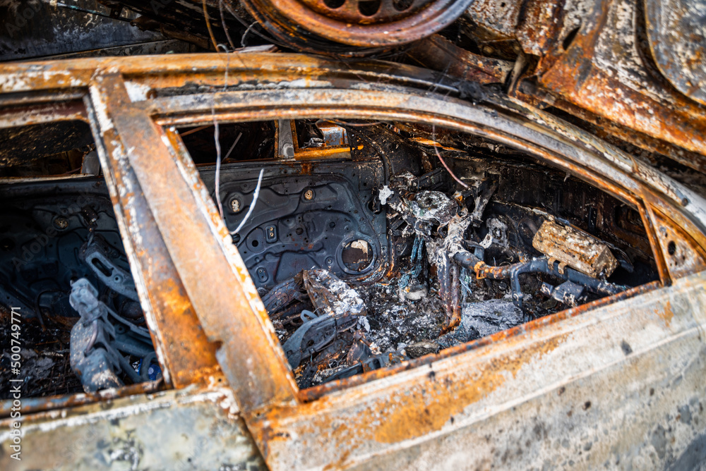IRPIN, Kyiv REGION, UKRAINE 24.04.2022. Car graveyard. Shot cars of civilians. russia's war against Ukraine IRPIN, Kyiv REGION, UKRAINE 24.04.2022. Car graveyard. Shot cars of civilians. russia's war against Ukraine