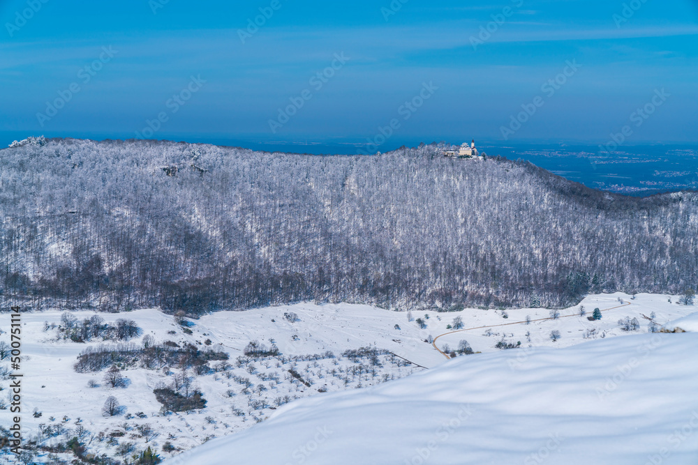 Germany, Castle teck on swabian alb mountain teckberg covered by snow in winter wonderland nature landscape scene, magical panorama view on sunny day Germany, Castle teck on swabian alb mountain teckberg covered by snow in winter wonderland nature landscape scene, magical panorama view on sunny day