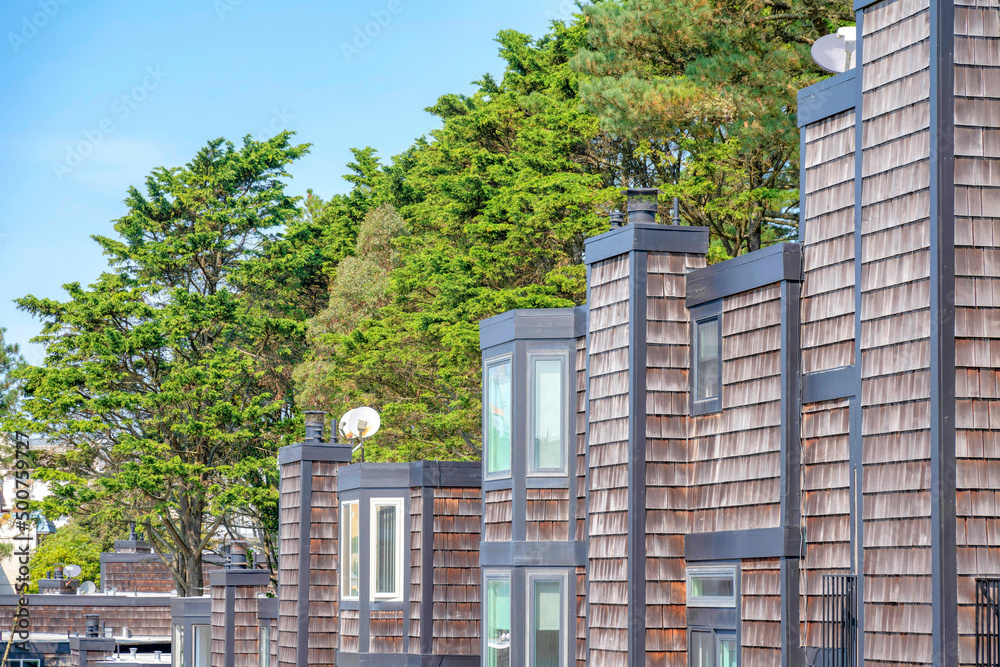 Complex residential building in San Francisco, California with wood shingle sidings exterior