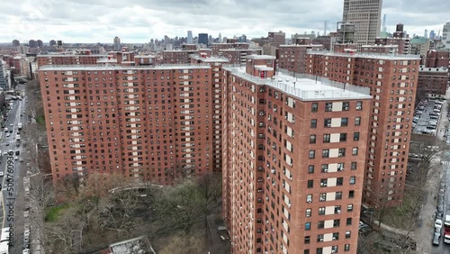 aerial rising above housing projects in Harlem NYC