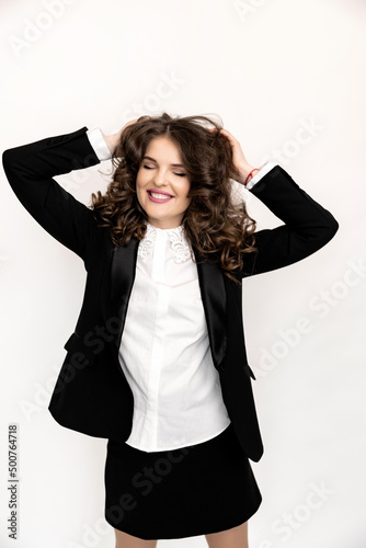 Close up portrait. emotional stylish female freelancer or student smiling and looking at the camera. Young business woman making financial report or presentation, distant work or study concept