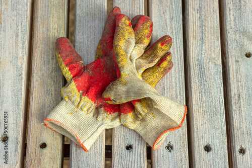Dirty work gloves.