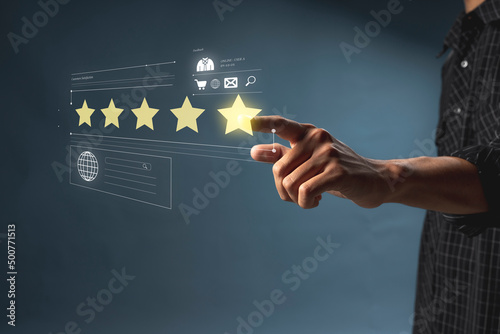 Obraz na płótnie Rise on increasing five stars in human hand, Increase rating evaluation classification w salonie