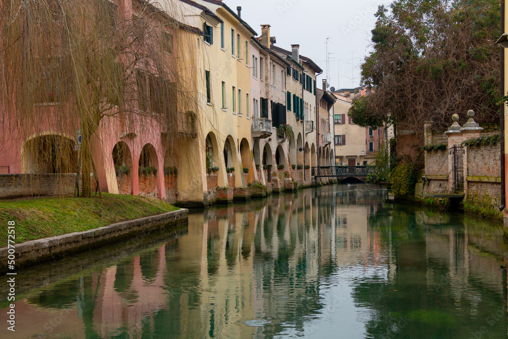 Colored buildings along the Buranelli canal, a beautiful view of the historic center of Treviso