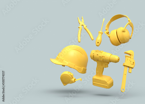 Fototapeta Naklejka Na Ścianę i Meble -  Flying view of yellow construction tools for repair on grey background