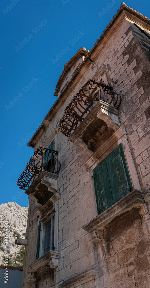 View looking up at an  ancient building in the old town of Omis, Croatia
