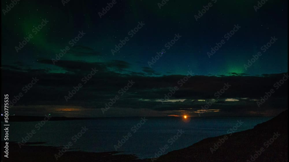 night view of the sea and aurora borealis night view of the sea and aurora borealis