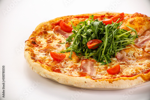 Pizza with bacon and rucola