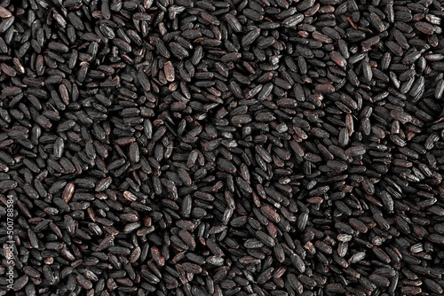 Texture of black worshipped rice grains