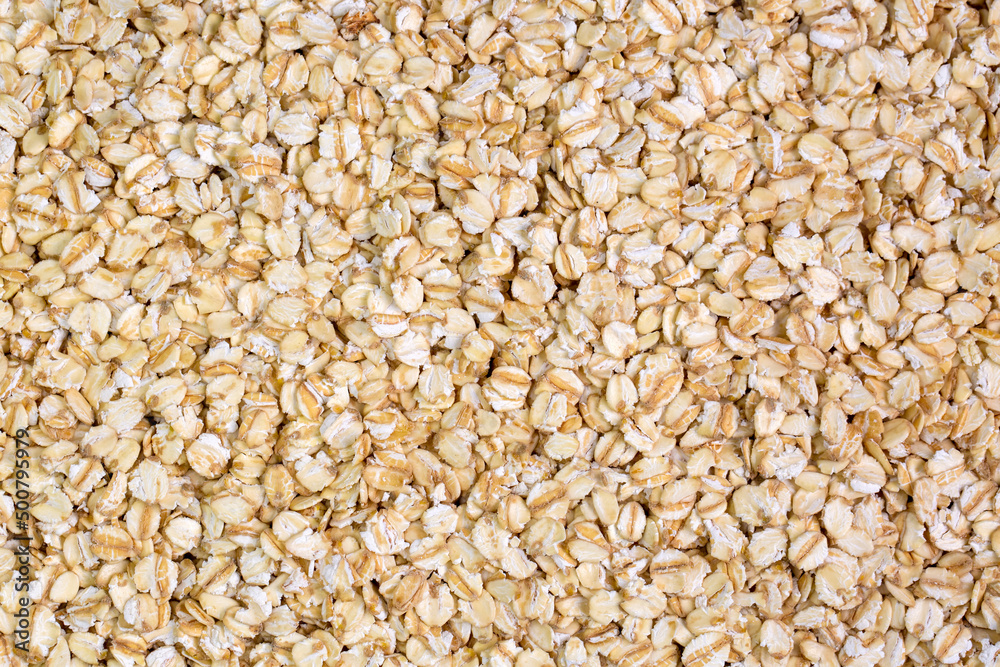 Heap of dry rolled oats isolated Heap of dry rolled oats isolated