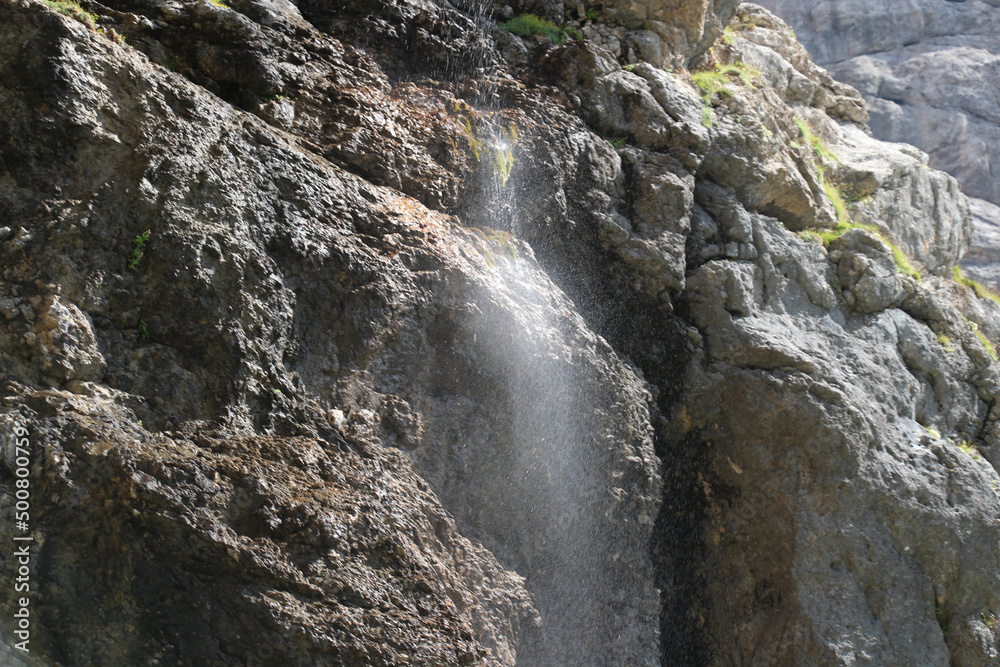 Obraz premium Close up of waterfall. Waterfall stream in Italian Alps.
