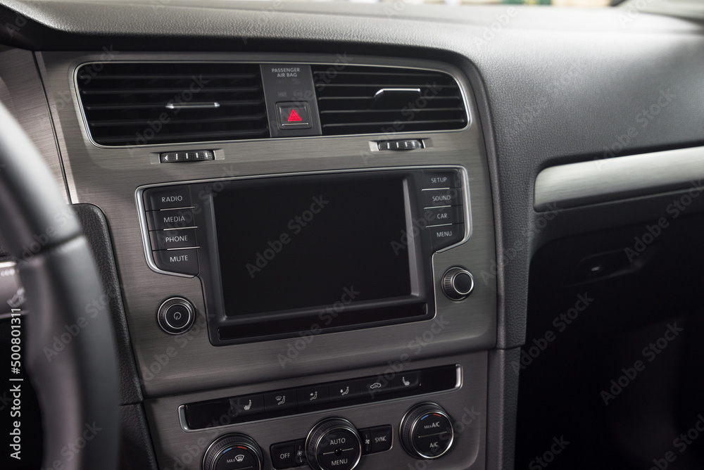 Car multimedia screen close-up. Interior detail.