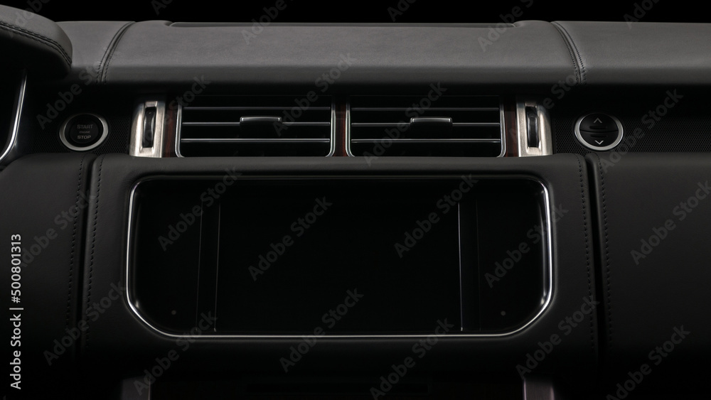 Fototapeta premium Multimedia screen in modern car. Interior detail. Horizontal photo.