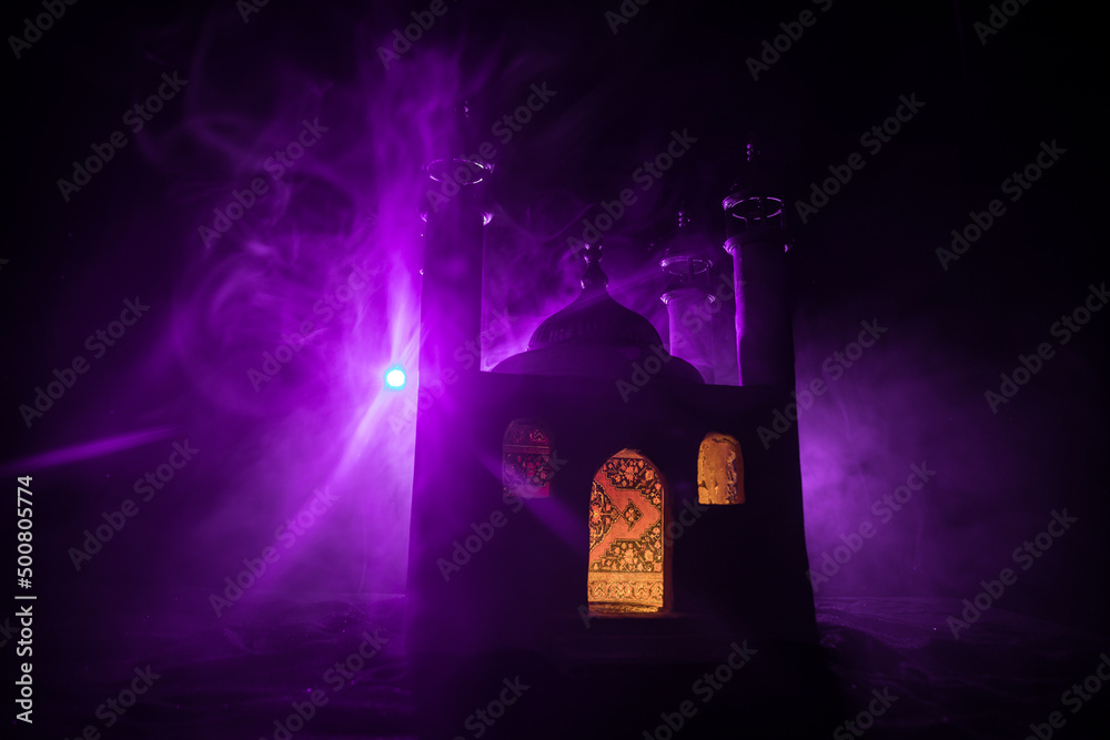 A realistic Mosque miniature with windows at night. Festive greeting card, invitation for Muslim holy month Ramadan Kareem. A realistic Mosque miniature with windows at night. Festive greeting card, invitation for Muslim holy month Ramadan Kareem.